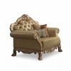45" Ivory Faux Leather And Gold Patina Ornate Arm Chair